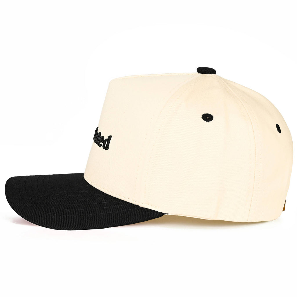 OVERSTIMULATED Letter Embroidered Two Tone Trucker Cap