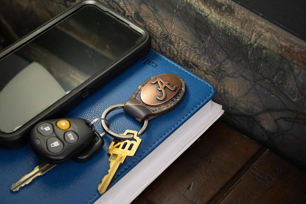Alabama Crimson Tide Oval Camo Leather Key Fob.